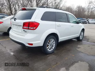 2016 Dodge Journey SXT with VIN 3C4PDCBG0GT206463, listed as a IAAI auction lot 41832864 with 135,409 mi miles. Bid and sale history available at carsss.com. Image 4.