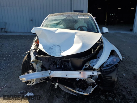 2023 Tesla Model Y Long Range z VIN 7SAYGAEE1PF810888, wystawiony jako Copart lot #88991735 z przebiegiem Nie podano mil oraz Nie do naprawy • Non repairable. Historia ofert i sprzedaży dostępna na DreamBid. Obrazek 5.