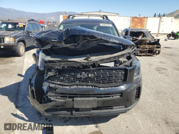 2022 Kia Telluride SX with VIN 5XYP5DHC0NG242472, listed as a Copart auction lot 43958185 with 57,604 mi miles and Salvage title. Bid and sale history available at DreamBid. Image 5.