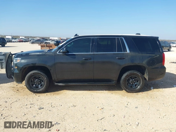 2015 Chevrolet Tahoe Commercial z VIN 1GNLC2EC7FR575386, wystawiony jako IAAI lot #41836137 z przebiegiem 143 231 mil mil oraz . Historia ofert i sprzedaży dostępna na DreamBid. Obrazek 14.