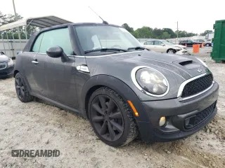 2013 MINI Convertible S с VIN WMWZP3C58DT550592, выставлен на аукционе Copart как лот 56250685 с пробегом 141 821 миль миль и Списание • Salvage title. История ставок и продаж доступна на DreamBid. Изображение 4.