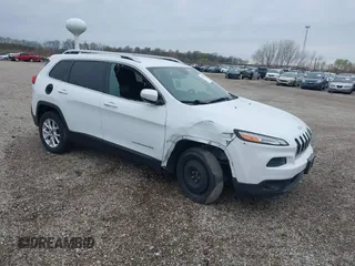 2014 Jeep Cherokee Latitude z VIN 1C4PJMCB2EW167593, wystawiony jako IAAI lot #41332268 z przebiegiem 134 556 mil mil oraz . Historia ofert i sprzedaży dostępna na DreamBid. Obrazek 1.