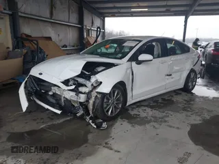 2017 Ford Fusion SE with VIN 3FA6P0H74HR196954, listed as a IAAI auction lot 41636002 with 70,366 mi miles and . Bid and sale history available at DreamBid. Image 2.