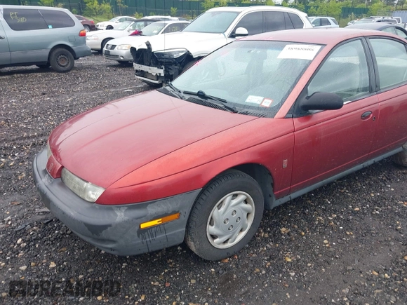 1997 Saturn SL with VIN 1G8ZF5289VZ138039, listed as a IAAI auction lot 39432871 with 125,022 mi miles. Bid and sale history available at carsss.com. Image 6.
