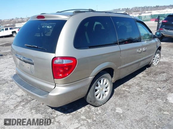 2002 Chrysler Town & Country EX with VIN 2C8GP74LX2R573857, listed as a IAAI auction lot 41846302 with Not Provided miles and . Bid and sale history available at carsss.com. Image 4.