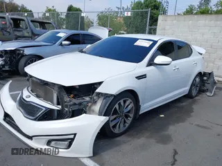 2015 Kia Optima SX with VIN 5XXGR4A73FG372592, listed as a IAAI auction lot 42575509 with 148,043 mi miles and . Bid and sale history available at DreamBid. Image 2.