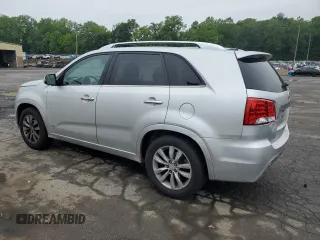 2013 Kia Sorento SX with VIN 5XYKWDA27DG364852, listed as a Copart auction lot 60194635 with 146,829 mi miles and Salvage title. Bid and sale history available at DreamBid. Image 2.