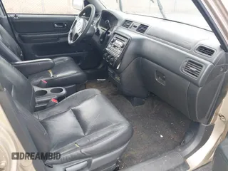 2000 Honda CR-V SE with VIN JHLRD1874YC046995, listed as a IAAI auction lot 42033059 with 218,484 mi miles. Bid and sale history available at carsss.com. Image 5.