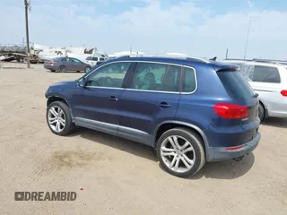 2012 Volkswagen Tiguan SEL with VIN WVGAV7AX8CW536752, listed as a IAAI auction lot 41798619 with 128,223 mi miles and . Bid and sale history available at DreamBid. Image 3.