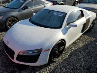 2014 Audi R8 V8 z VIN WUADUAFG5EN000704, wystawiony jako Copart lot #73885864 z przebiegiem Nie podano mil oraz Szkoda całkowita • Salvage title. Historia ofert i sprzedaży dostępna na DreamBid. Obrazek 1.
