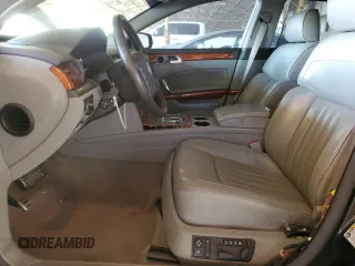 2004 Volkswagen Phaeton V8 z VIN WVWAF63D548010888, wystawiony jako Copart lot #77903574 z przebiegiem 68 511 mil mil oraz Szkody całkowita. Historia ofert i sprzedaży dostępna na DreamBid. Obrazek 7.