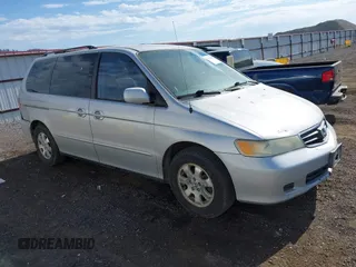 2003 Honda Odyssey EX-L z VIN 5FNRL18053B064369, wystawiony jako IAAI lot #42372654 z przebiegiem 227 347 mil mil oraz . Historia ofert i sprzedaży dostępna na DreamBid. Obrazek 1.