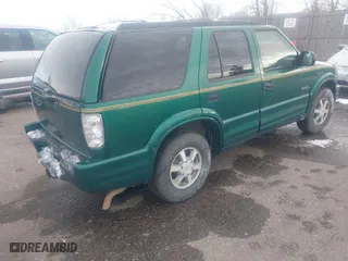 1999 Oldsmobile Bravada with VIN 1GHDT13W7X2711363, listed as a IAAI auction lot 41294782 with 198,508 mi miles. Bid and sale history available at carsss.com. Image 4.