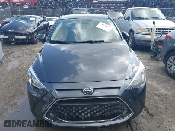 2019 Toyota Yaris L z VIN 3MYDLBYV4KY528641, wystawiony jako IAAI lot #41935993 z przebiegiem 61 940 mil mil oraz . Historia ofert i sprzedaży dostępna na DreamBid. Obrazek 12.