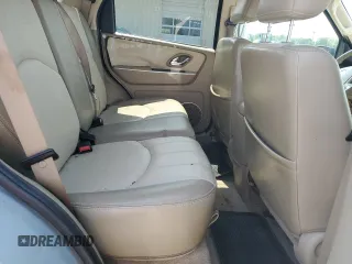 2005 Mercury Mariner Luxury z VIN 4M2YU57155DJ28005, wystawiony jako Copart lot #63460344 z przebiegiem 131 531 mil mil oraz Szkody całkowita. Historia ofert i sprzedaży dostępna na DreamBid. Obrazek 11.