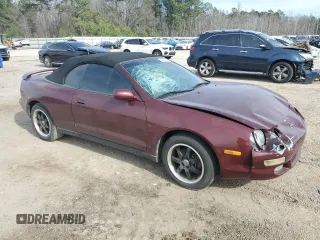 1999 Toyota Celica GT with VIN JT5FG02T1X0055351, listed as a Copart auction lot 45647655 with 176,003 mi miles and Salvage Title. Bid and sale history available at carsss.com. Image 4.