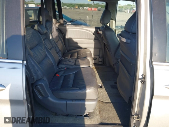 2007 Honda Odyssey EX-L z VIN 5FNRL38677B449602, wystawiony jako IAAI lot #42030774 z przebiegiem 179 563 mil mil oraz . Historia ofert i sprzedaży dostępna na DreamBid. Obrazek 8.