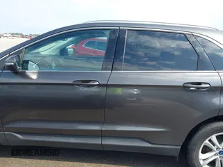 2020 Ford Edge SEL z VIN 2FMPK3J9XLBA54556, wystawiony jako IAAI lot #42179907 z przebiegiem 63 449 mil mil oraz . Historia ofert i sprzedaży dostępna na DreamBid. Obrazek 14.