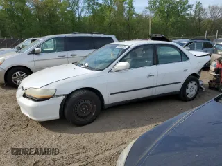 2000 Honda Accord LX z VIN 1HGCG1642YA080255, wystawiony jako Copart lot #53636855 z przebiegiem 146 478 mil mil oraz Szkoda całkowita • Salvage title. Historia ofert i sprzedaży dostępna na DreamBid. Obrazek 1.