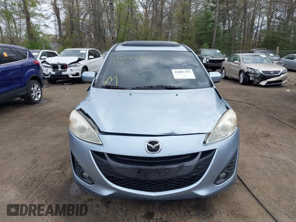 2012 Mazda 5 Grand Touring with VIN JM1CW2DL4C0141511, listed as a IAAI auction lot 42001392 with 99,097 mi miles and . Bid and sale history available at carsss.com. Image 12.
