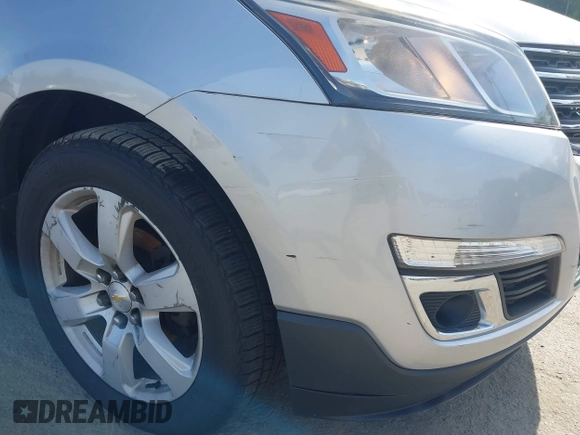 2016 Chevrolet Traverse LT z VIN 1GNKVGKD9GJ181209, wystawiony jako IAAI lot #42375172 z przebiegiem Nie podano mil oraz . Historia ofert i sprzedaży dostępna na DreamBid. Obrazek 6.