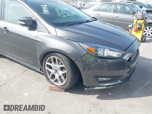 2015 Ford Focus SE with VIN 1FADP3F25FL348929, listed as a IAAI auction lot 42275725 with 99,668 mi miles and . Bid and sale history available at DreamBid. Image 6.