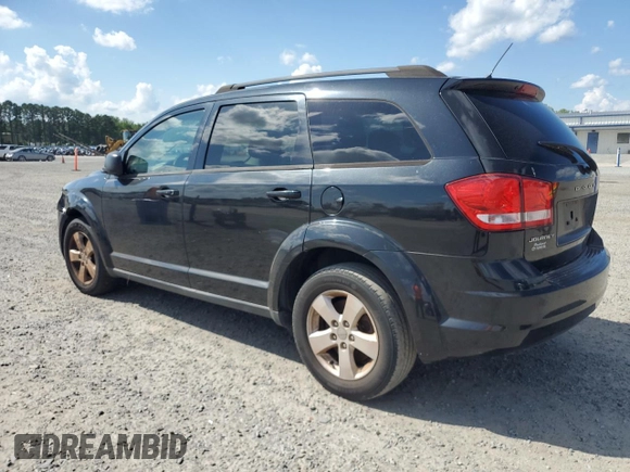 2013 Dodge Journey SE with VIN 3C4PDCAB4DT537984, listed as a Copart auction lot 62683165 with 228,062 mi miles and Clean title. Bid and sale history available at DreamBid. Image 2.