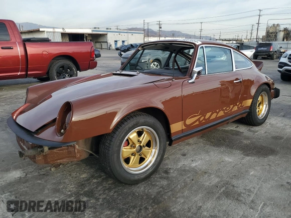 1975 Porsche 911 with VIN 9115201599, listed as a Copart auction lot 79267654 with 69,699 mi miles and Salvage title. Bid and sale history available at DreamBid. Image 1.