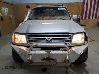 1999 Toyota Land Cruiser with VIN JT3HT05JXX0063617, listed as a Copart auction lot 86342654 with 230,315 mi miles and Clean Title. Bid and sale history available at carsss.com. Image 5.