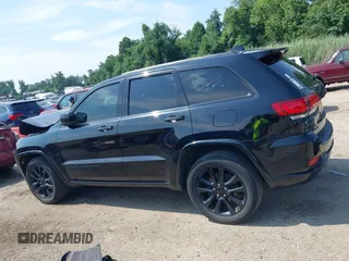 2018 Jeep Grand Cherokee Upland with VIN 1C4RJFAG2JC350975, listed as a IAAI auction lot 42612836 with 148,435 mi miles and . Bid and sale history available at DreamBid. Image 14.