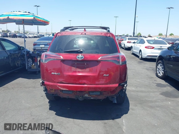 2018 Toyota RAV4 XLE with VIN 2T3WFREV4JW505053, listed as a IAAI auction lot 42552459 with 94,552 mi miles and . Bid and sale history available at DreamBid. Image 17.
