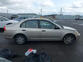 2001 Honda Civic LX with VIN JHMES16551S008933, listed as a IAAI auction lot 41912653 with 142,277 mi miles and . Bid and sale history available at DreamBid. Image 13.