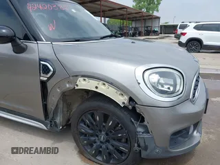 2018 MINI Countryman Cooper S with VIN WMZYT3C3XJ3E00006, listed as a IAAI auction lot 42420388 with 117,313 mi miles and . Bid and sale history available at DreamBid. Image 19.