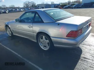 1999 Mercedes-Benz SL-Class with VIN WDBFA68F6XF181288, listed as a IAAI auction lot 41687202 with 63,259 mi miles. Bid and sale history available at carsss.com. Image 3.