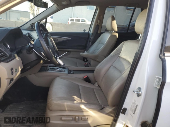 2022 Honda Ridgeline RTL-E with VIN 5FPYK3F77NB031233, listed as a Copart auction lot 49735525 with 71,450 mi miles and Salvage Title. Bid and sale history available at DreamBid. Image 7.