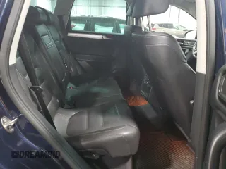 2014 Volkswagen Touareg Lux z VIN WVGEF9BP4ED006236, wystawiony jako Copart lot #47394505 z przebiegiem 85 179 mil mil oraz Szkoda całkowita • Salvage title. Historia ofert i sprzedaży dostępna na DreamBid. Obrazek 11.
