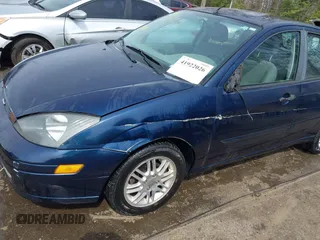 2004 Ford Focus ZX5 z VIN 3FAFP37334R120359, wystawiony jako IAAI lot #41922026 z przebiegiem 115 789 mil mil oraz . Historia ofert i sprzedaży dostępna na DreamBid. Obrazek 6.