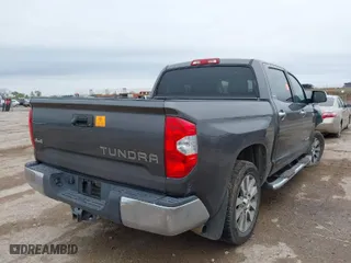 2016 Toyota Tundra 4WD Truck LTD with VIN 5TFHW5F19GX490700, listed as a IAAI auction lot 41958974 with 252,002 mi miles. Bid and sale history available at carsss.com. Image 4.