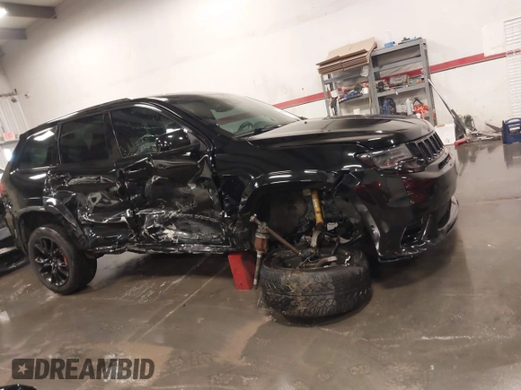 2017 Jeep Grand Cherokee SRT with VIN 1C4RJFDJ9HC739324, listed as a IAAI auction lot 40898998 with 92,547 mi miles. Bid and sale history available at carsss.com. Image 13.