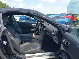 2014 Mercedes-Benz SL 63 AMG z VIN WDDJK7EA3EF029818, wystawiony jako IAAI lot #42123474 z przebiegiem 36 772 mil mil oraz . Historia ofert i sprzedaży dostępna na DreamBid. Obrazek 5.