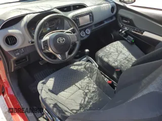 2015 Toyota Yaris L with VIN VNKJTUD34FA022097, listed as a Copart auction lot 53857825 with 106,680 mi miles and Salvage title. Bid and sale history available at DreamBid. Image 8.
