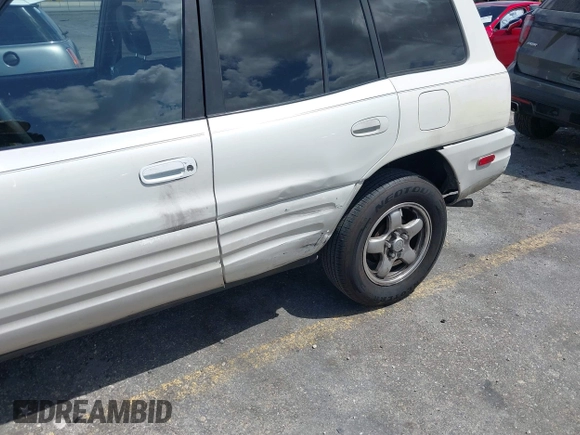 1999 Toyota RAV4 with VIN JT3GP10V5X7043735, listed as a IAAI auction lot 41939137 with 206,044 mi miles and . Bid and sale history available at DreamBid. Image 6.