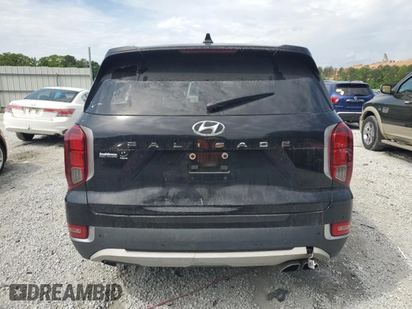 2022 Hyundai Palisade SEL z VIN KM8R44HE2NU418557, wystawiony jako Copart lot #54136245 z przebiegiem 93 800 mil mil oraz Czysty tytuł • Clean title. Historia ofert i sprzedaży dostępna na DreamBid. Obrazek 6.