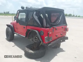 1999 Jeep Wrangler SE with VIN 1J4FY29P8XP464616, listed as a IAAI auction lot 42538529 with 126,497 mi miles and . Bid and sale history available at DreamBid. Image 3.