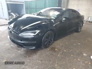 2022 Tesla Model S Plaid with VIN 5YJSA1E64NF477855, listed as a IAAI auction lot 41470591 with Not provided miles and . Bid and sale history available at DreamBid. Image 17.