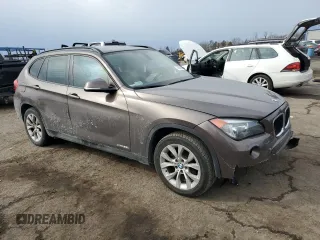 2014 BMW X1 xDrive28i with VIN WBAVL1C5XEVY14142, listed as a Copart auction lot 46693985 with 70,504 mi miles and Salvage Title. Bid and sale history available at carsss.com. Image 4.