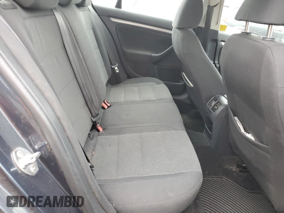 2010 Volkswagen Jetta S z VIN 3VWJX7AJ7AM027269, wystawiony jako Copart lot #60443375 z przebiegiem Nie podano mil oraz Szkoda całkowita • Salvage title. Historia ofert i sprzedaży dostępna na DreamBid. Obrazek 10.