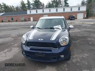 2013 MINI Countryman S z VIN WMWZC3C57DWP22864, wystawiony jako IAAI lot #42041909 z przebiegiem 139 932 mil mil oraz . Historia ofert i sprzedaży dostępna na DreamBid. Obrazek 6.