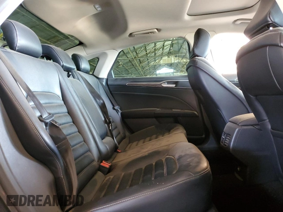 2020 Ford Fusion SEL z VIN 3FA6P0CD3LR131180, wystawiony jako Copart lot #63843355 z przebiegiem 146 705 mil mil oraz Czysty tytuł • Clean title. Historia ofert i sprzedaży dostępna na DreamBid. Obrazek 10.