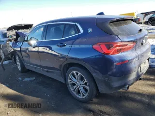 2018 BMW X2 xDrive28i with VIN WBXYJ5C37JEF69697, listed as a Copart auction lot 88116785 with 48,721 mi miles and Salvage Title. Bid and sale history available at carsss.com. Image 2.